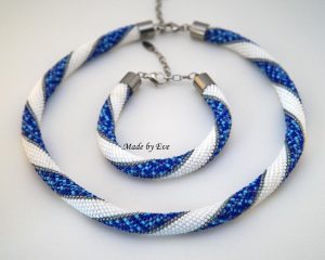 white and blue set of jewelry